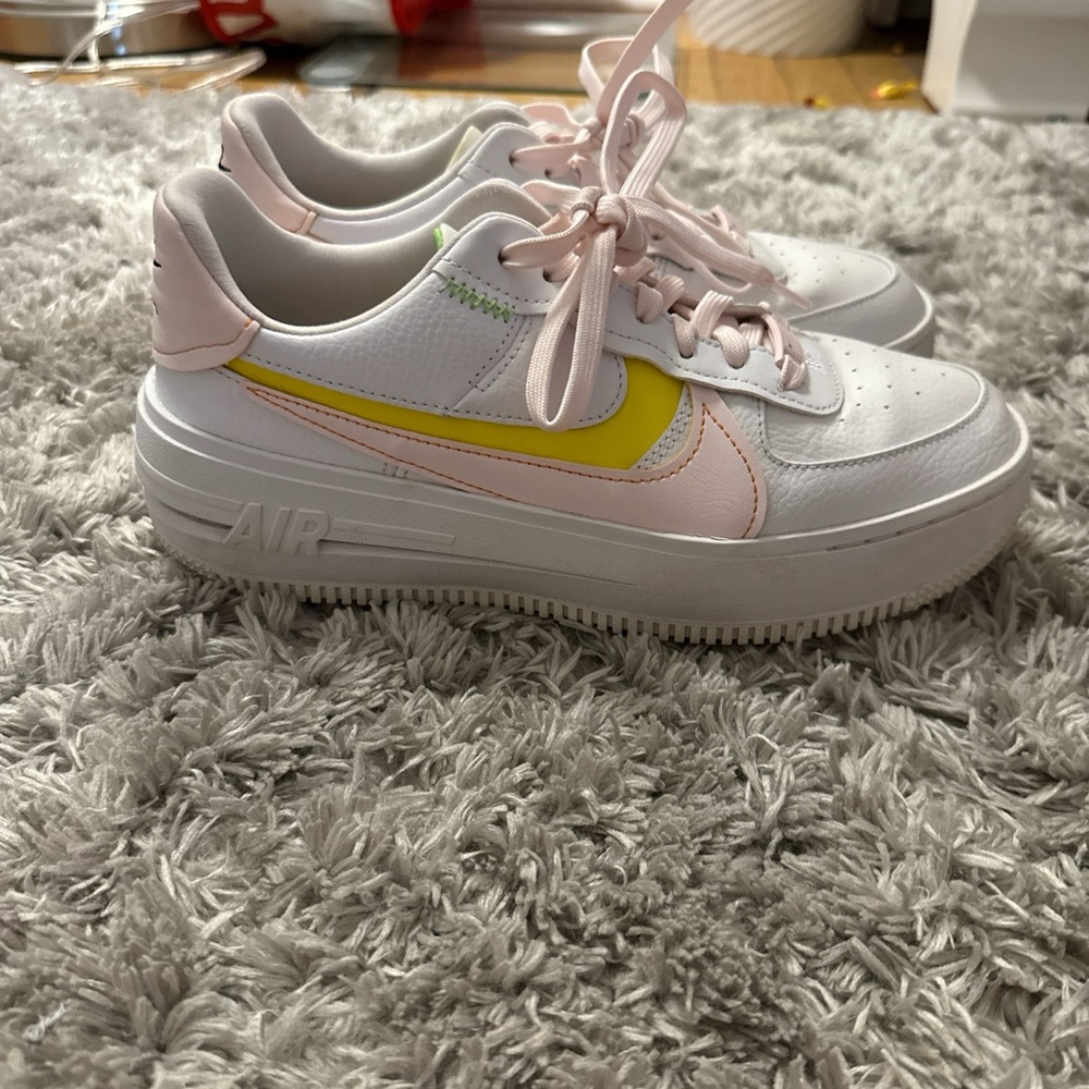 Nike Women's White and Pink Sneakers with Yellow Accent